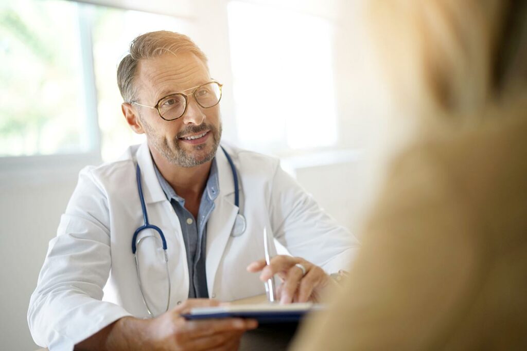 Doctor with patient